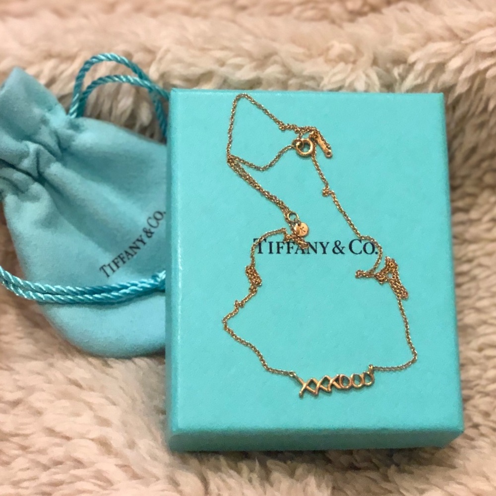 SOLD! Tiffany and co. 18k gold XXXOOO necklace
